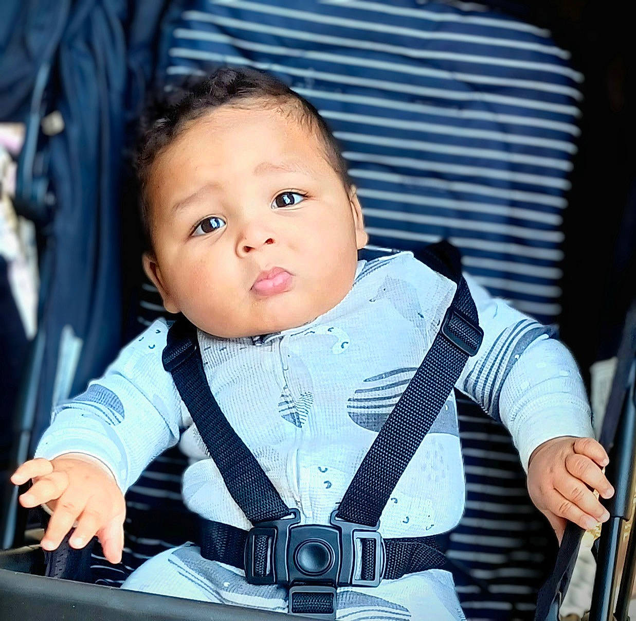 Jessiah is registered to the contest to win money with this photo: baby, baby_carriage, baby_products, baby_safety, baby_toddler_clothing, car_seat, cheek, child, electric_blue, eye, eyelash, flash_photography, happy, head, iris, person, product, sitting, sleeve, strap