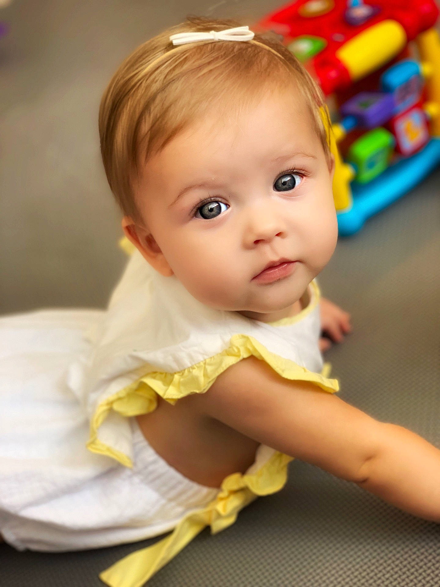 Everly joined the competition — help win amazing prizes! blond, cheek, child, child_model, eye, girl, human_hair_color, infant, iris, person, skin, smile, toddler, yellow