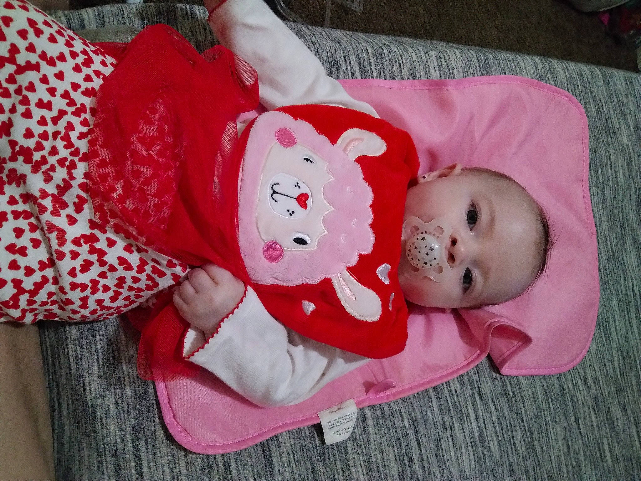 Roxy joined the competition — help win amazing prizes! baby, baby_products, baby_toddler_clothing, carmine, cheek, child, comfort, costume_hat, face, happy, hat, head, magenta, person, pink, product, room, sleeve, textile, toddler