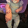 baby, pacifier, headband, bow, floral_pants, infant, cute, child, person, hand, arm, blanket, indoor, home, clothing, foot, leg, sitting, holding, portrait