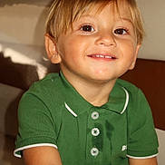 Aaron participe au concours pour gagner de l'argent avec cette photo : child, smile, green_polo_shirt, wet_stain, indoor, young_boy, short_hair, happy, portrait, sitting, casual_clothing, face, person, cute, light_skin, buttoned_shirt, brown_eyes, closeup, happy_expression, kid