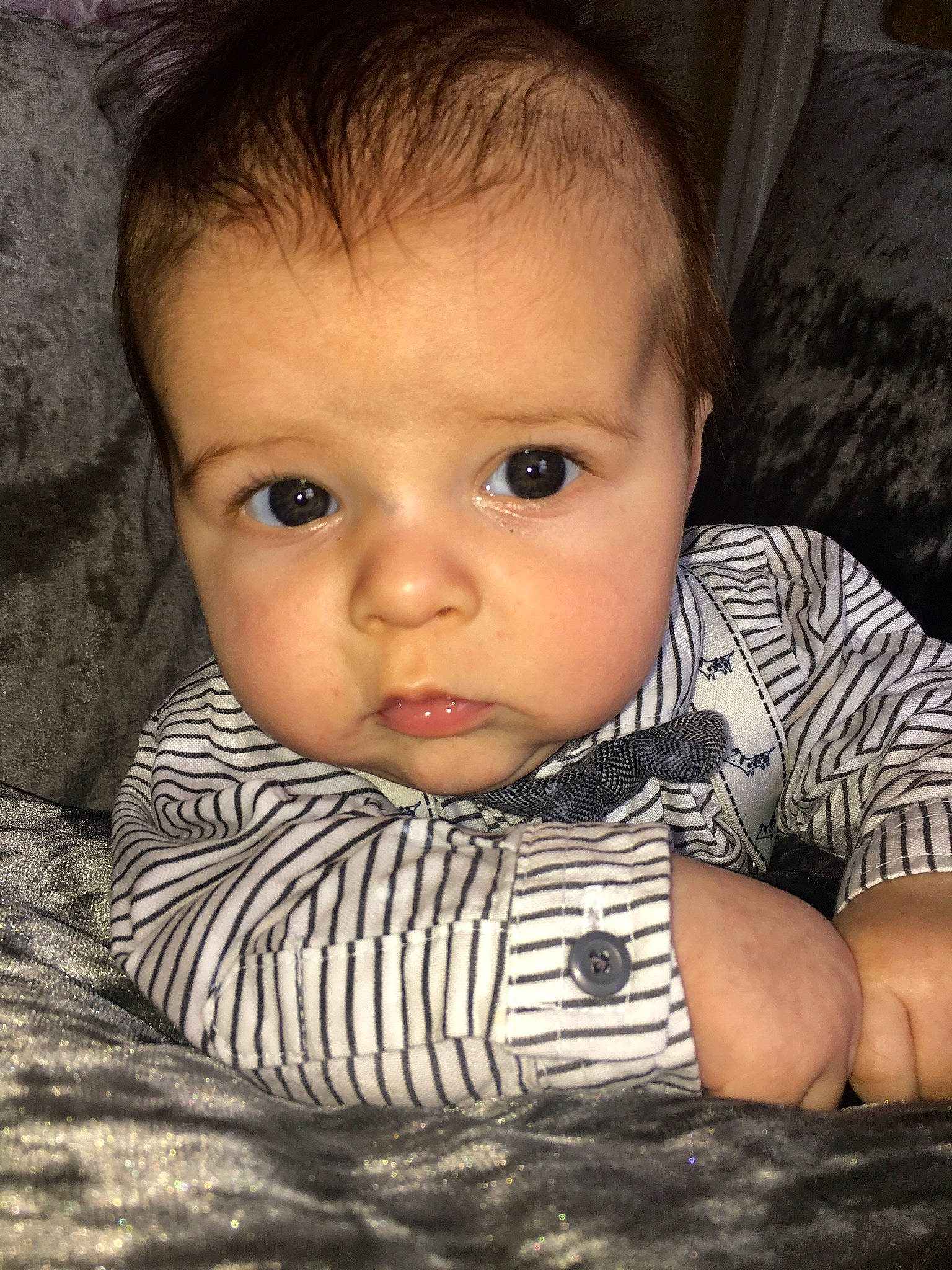 Paul-junior Scott Williams is registered to the contest to win money with this photo: baby, cheek, child, chin, eye, face, forehead, head, iris, lip, mouth, nose, organ, person, photography, portrait, skin, smile, toddler, tummy_time