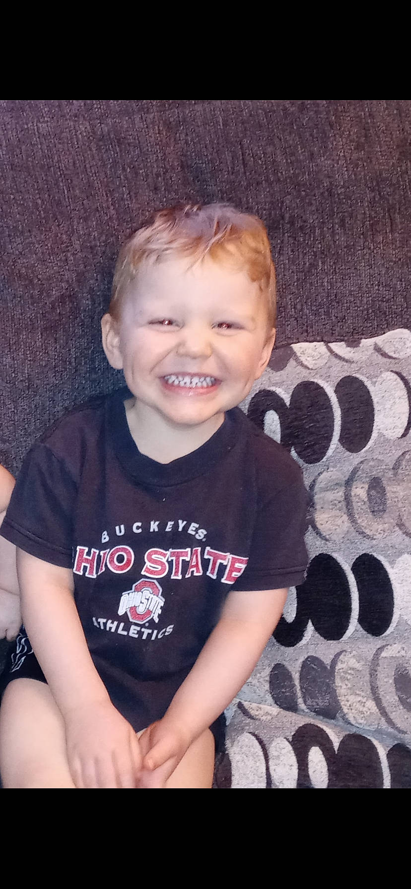 Lincoln is registered to the contest to win money with this photo: arm, baby, baby_toddler_clothing, cheek, chin, cool, facial_expression, finger, happy, iris, joy, lip, mammal, neck, nose, person, pink, skin, sleeve, smile