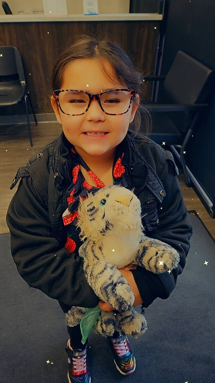 Paisley joined the competition — help win amazing prizes! bangs, carmine, chair, child, cool, eyewear, fun, fur, glasses, glove, hairstyle, happy, head, person, sitting, sleeve, standing, stuffed_toy, toddler, toy