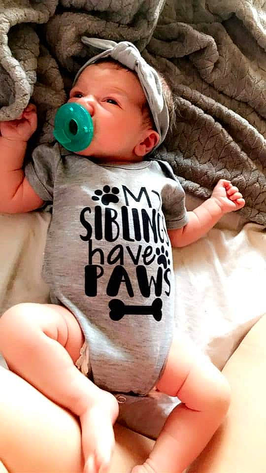 Kenzlee joined the competition — help win amazing prizes! baby, baby_toddler_clothing, cheek, child, cool, drinkware, facial_expression, finger, hand, happy, human_body, mouth, nail, person, skin, sleeve, t_shirt, thigh, thumb, toddler