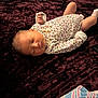 Nova joined the competition — help win amazing prizes! baby, sleeping, infant, onesie, floral_pattern, blanket, plush, cozy, peaceful, child, newborn, resting, soft, cute, human, portrait, indoors, hand, foot, relaxation
