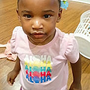 Shy'Annah joined the competition — help win amazing prizes! braids, child, colorful_clothing, curious, face, girl, hair_clips, home, indoors, laundry_basket, living_room, people, photograph, pink_shirt, portrait, purple_pants, smiling, standing, toddler, wooden_floor