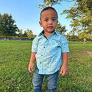 Dominic joined the competition — help win amazing prizes! child, toddler, boy, portrait, outdoor, park, grass, trees, blue_sky, sunlight, standing, fashion, shirt, jeans, sneakers, short_hair, looking_at_camera, full_body, playground, jogger