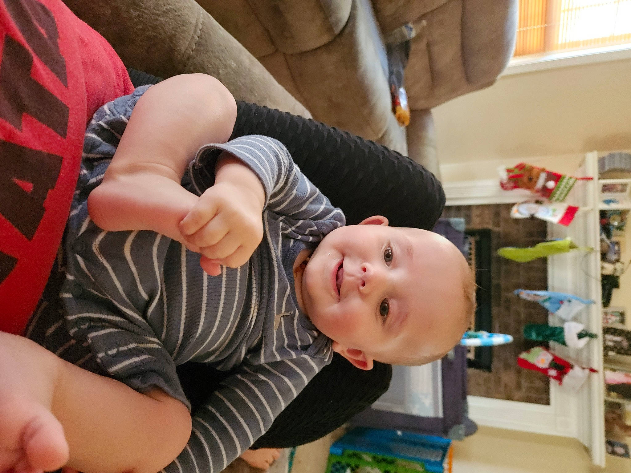 Harrison joined the competition — help win amazing prizes! abdomen, arm, baby, baby_products, child, comfort, elbow, fun, gesture, grass, happy, human_leg, joy, knee, person, room, shelf, sitting, smile, thigh