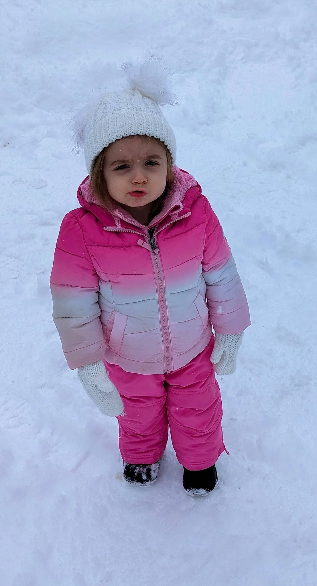 Madysyn is registered to the contest to win money with this photo: cheek, child, face, freezing, fun, glove, happy, head, headgear, headwear, ice_cap, jacket, magenta, outerwear, parka, person, pink, recreation, sleeve, snow