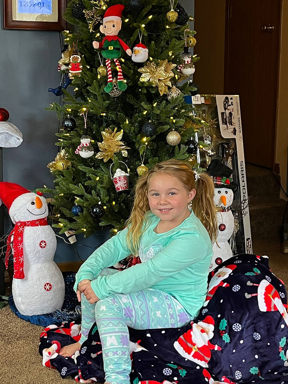 Keirra is registered to the contest to win money with this photo: christmas, christmas_decoration, christmas_eve, christmas_ornament, christmas_tree, event, happy, holiday, holiday_ornament, interior_design, joy, lap, ornament, people, person, plant, red, smile, snowman, toddler