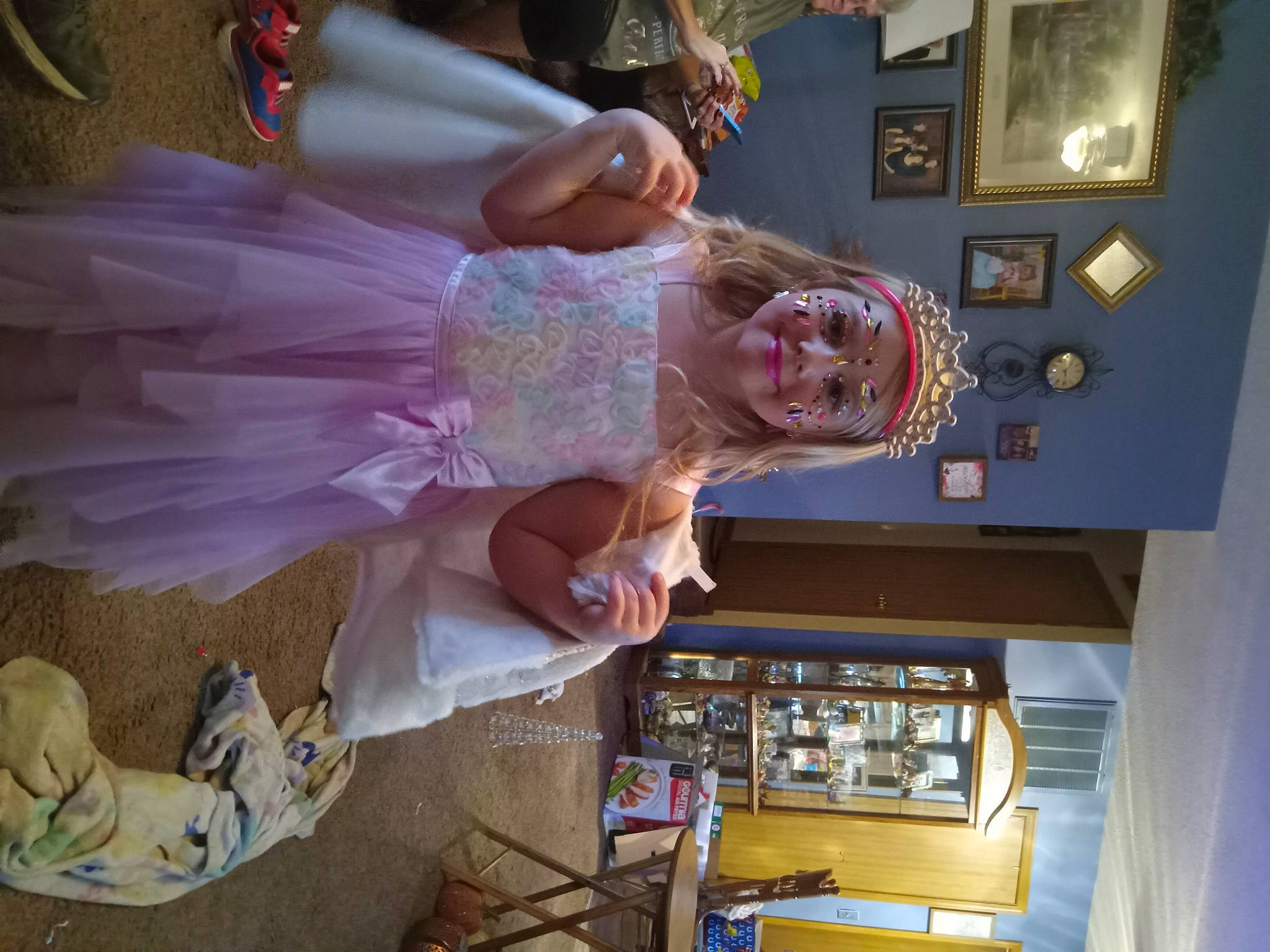 Keirra is registered to the contest to win money with this photo: art, embellishment, event, fashion_design, formal_wear, fun, happy, headwear, joy, magenta, pattern, person, picture_frame, purple, room, smile, tree, visual_arts, wood