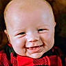 Austin joined the competition — help win amazing prizes! baby, black_clothing, cheerful, child, closeup, cute, expression, eyes, face, happy, head, indoors, infant, mouth, plaid, portrait, red_clothing, skin, smiling, young