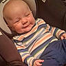 baby, blue_pants, car_seat, casual, child, clothing, comfort, cute, face, hand, happy, head, indoor, infant, person, portrait, seat, smiling, striped_shirt, young_child