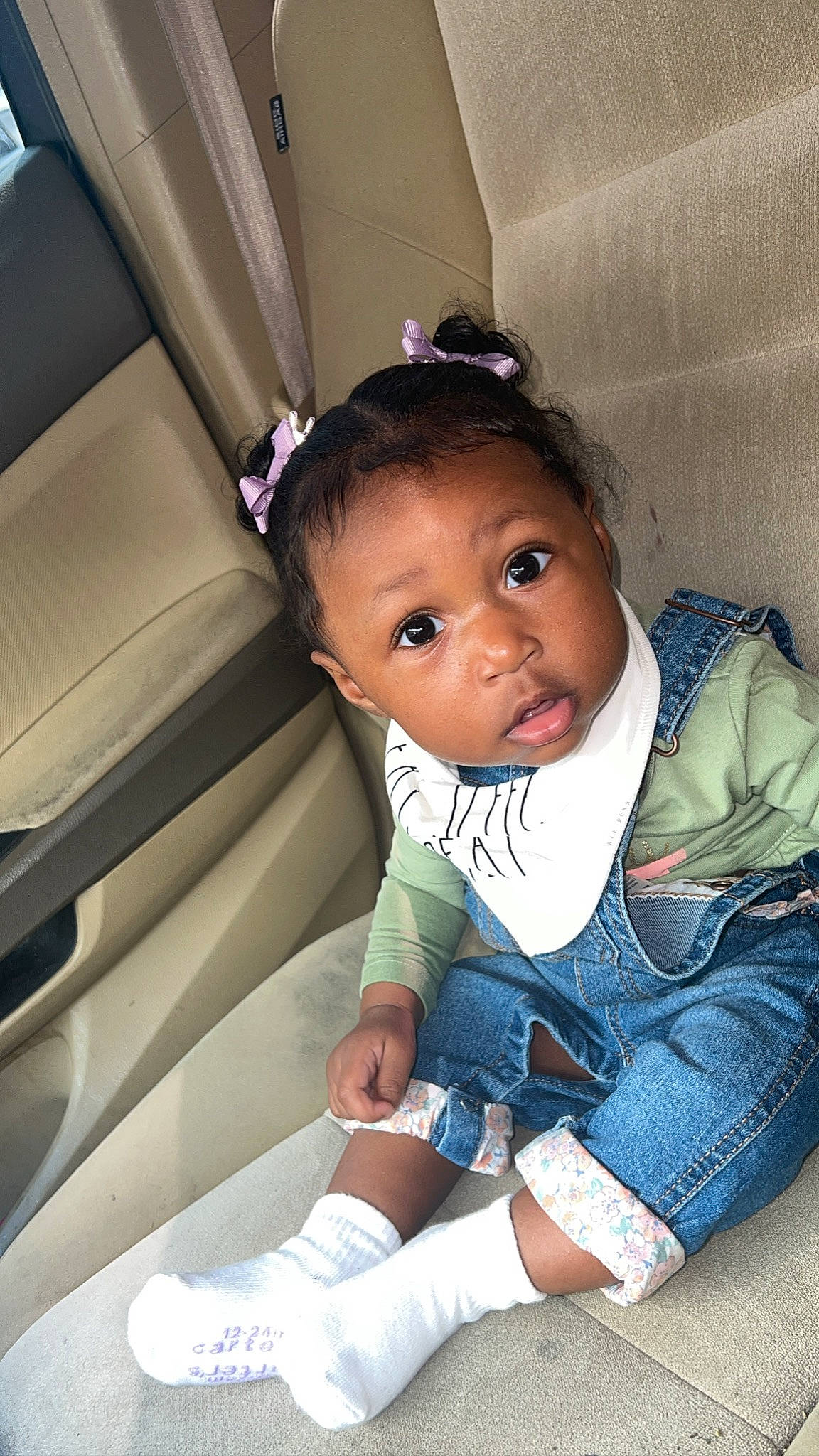 Briana is registered to the contest to win money with this photo: arm, automotive_design, baby, baby_toddler_clothing, car_seat, car_seat_cover, child, comfort, eye, face, flash_photography, fun, hairstyle, hand, happy, person, personal_luxury_car, skin, sleeve, surprise