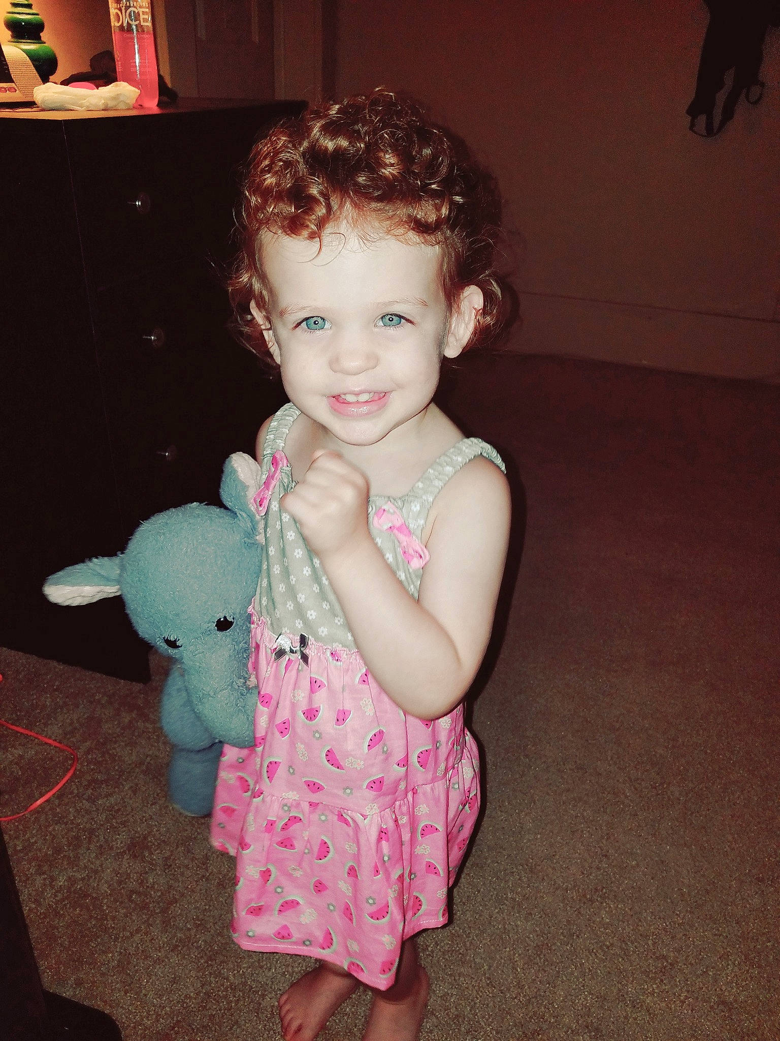 A'Rayah is registered to the contest to win money with this photo: cheek, child, ear, eye, fun, head, iris, joy, person, pink, skin, smile, standing, toddler, toy