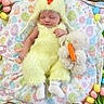 baby, child, costume, yellow, chick, easter, eggs, plush_toys, bunny, blanket, flowers, tulips, basket, sleeping, cute, holiday, spring, soft_toy, infant, decorations