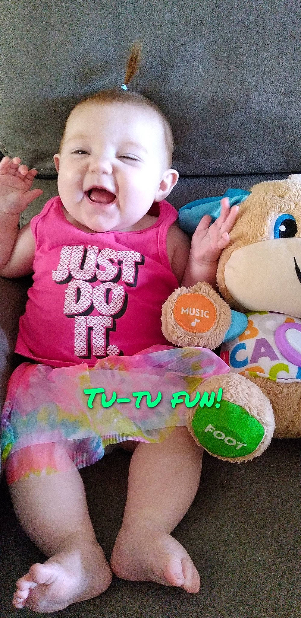 Rori is registered to the contest to win money with this photo: baby, baby_playing_with_toys, baby_toddler_clothing, cheek, eye, face, facial_expression, finger, happy, head, leg, mouth, nose, organ, person, pink, skin, sleeve, smile, textile