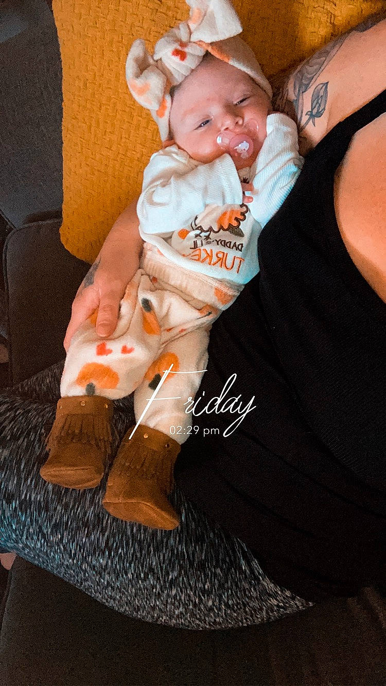 Emiliana is registered to the contest to win money with this photo: baby, baby_products, baby_toddler_clothing, chair, child, comfort, dress, event, flash_photography, fun, happy, hat, head, jewellery, lap, person, sitting, sleeve, smile, t_shirt