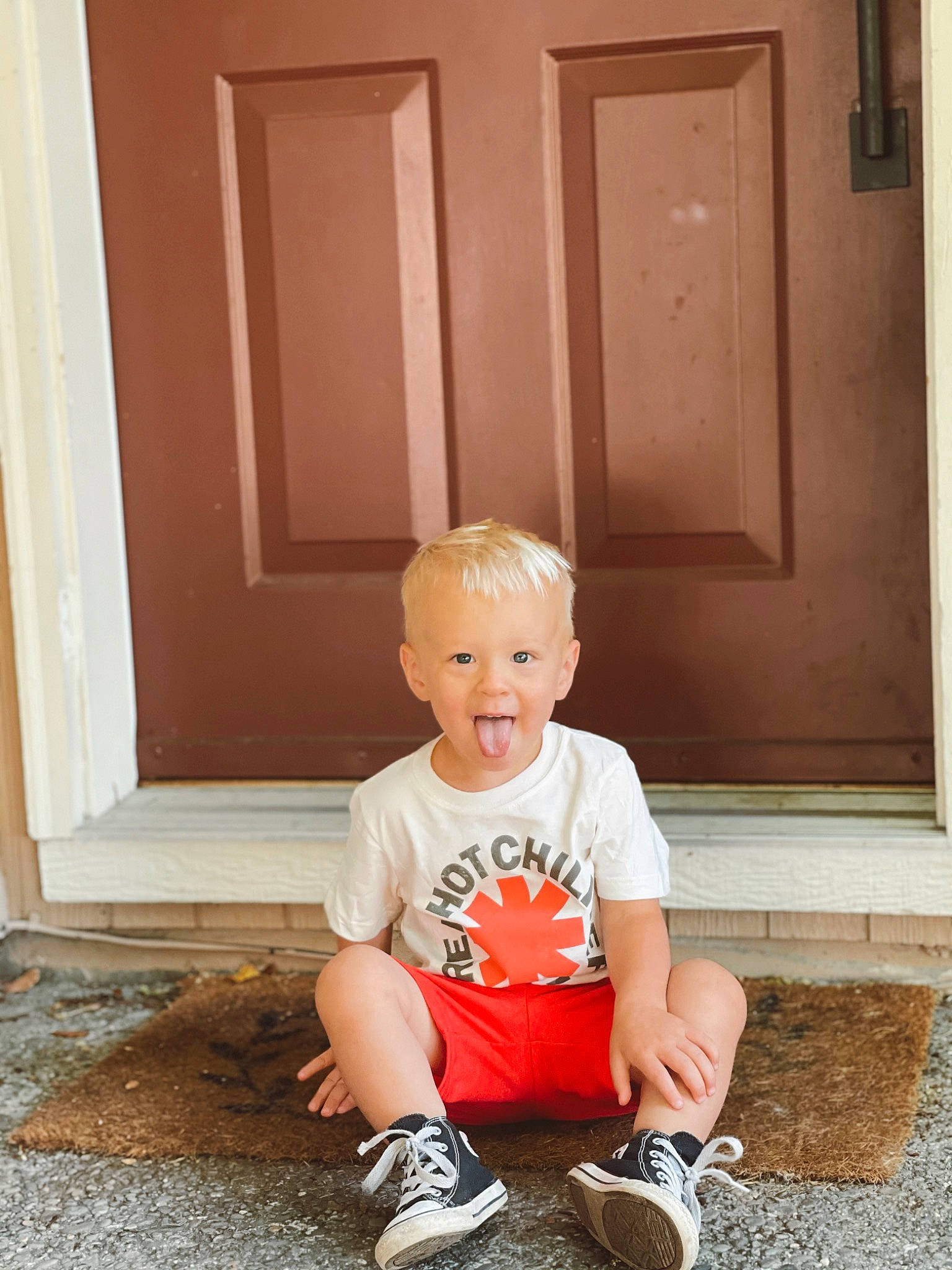 Axton joined the competition — help win amazing prizes! baby_toddler_clothing, child, cool, door, flooring, grass, hardwood, home_door, leisure, person, shoe, shorts, sitting, smile, sneakers, standing, t_shirt, tints_and_shades, toddler, walking_shoe