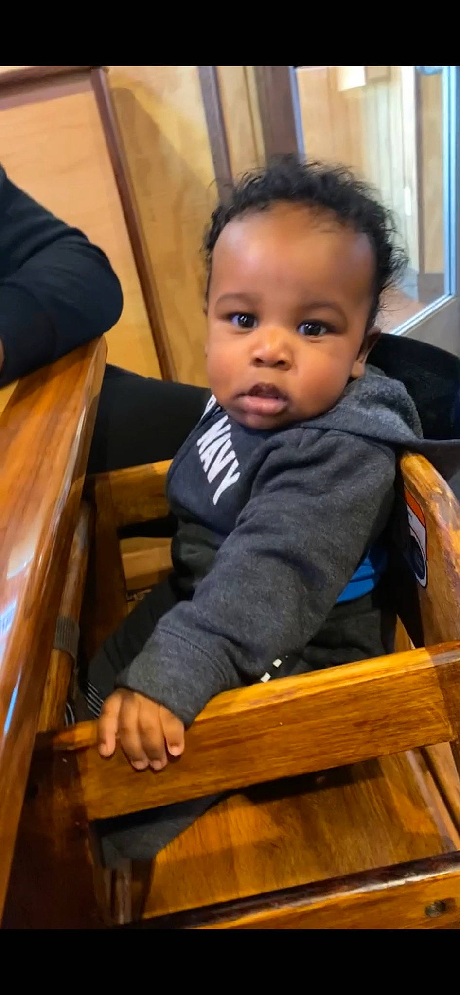 Kayden joined the competition — help win amazing prizes! baby, baby_toddler_clothing, chair, cheek, child, chin, comfort, eye, fun, happy, hardwood, iris, nose, person, room, sitting, skin, standing, toddler, varnish