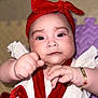 baby, infant, child, face, headband, red, white, clothing, cute, portrait, hands, wristband, expression, closeup, indoor, soft_lighting, curious, young, person, baby_girl