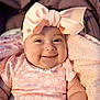 Ebony joined the competition — help win amazing prizes! baby, smiling, headband, bow, pink, blanket, onesie, infant, cute, happy, stroller, soft, cozy, child, portrait, closeup, chubby, skin, face, sunlight