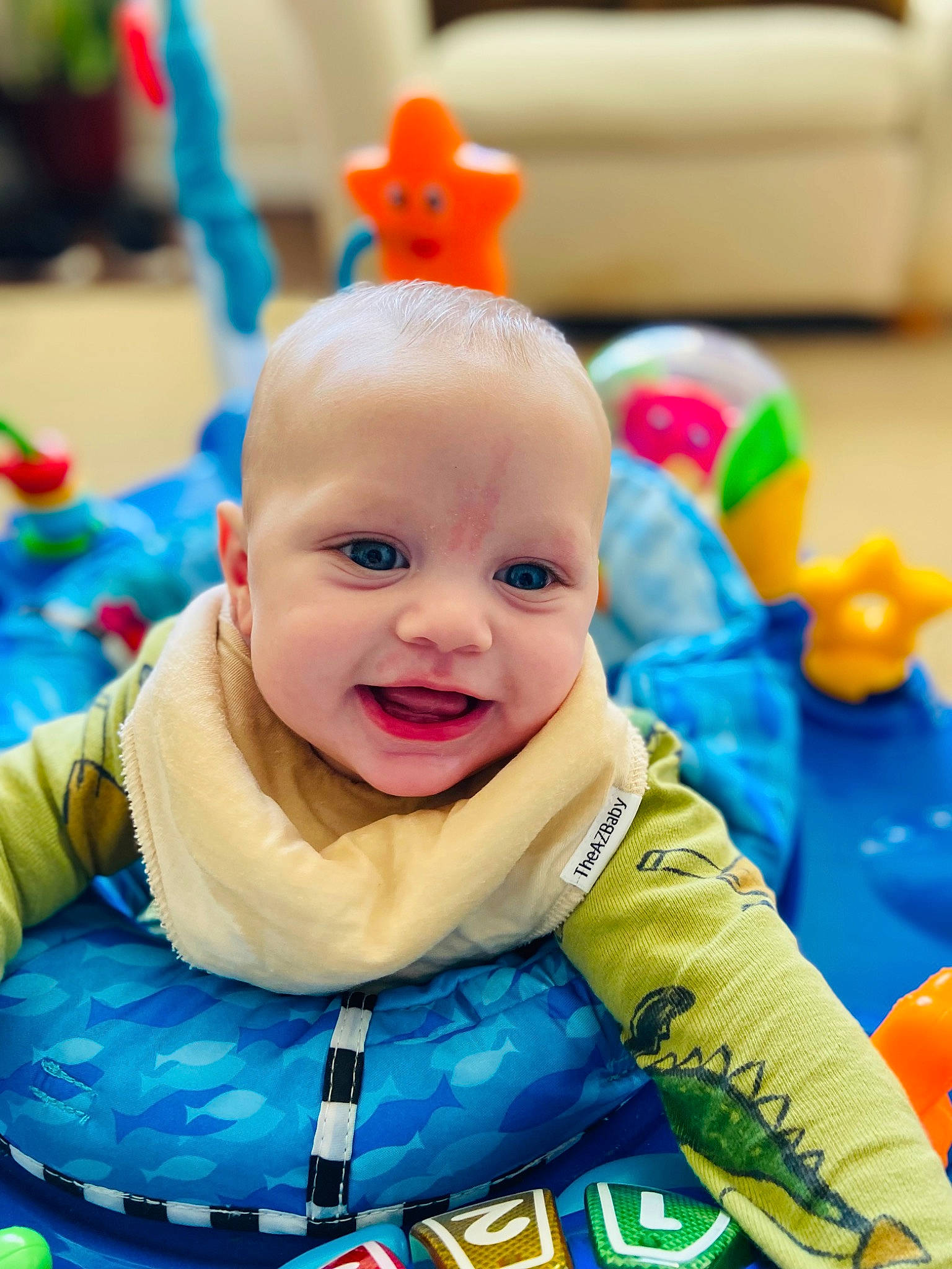 Samuel is registered to the contest to win money with this photo: baby, baby_laughing, baby_playing_with_toys, baby_products, baby_toddler_clothing, child, event, fun, happy, kindergarten, laugh, leisure, party, party_supply, person, play, recreation, room, sitting, smile