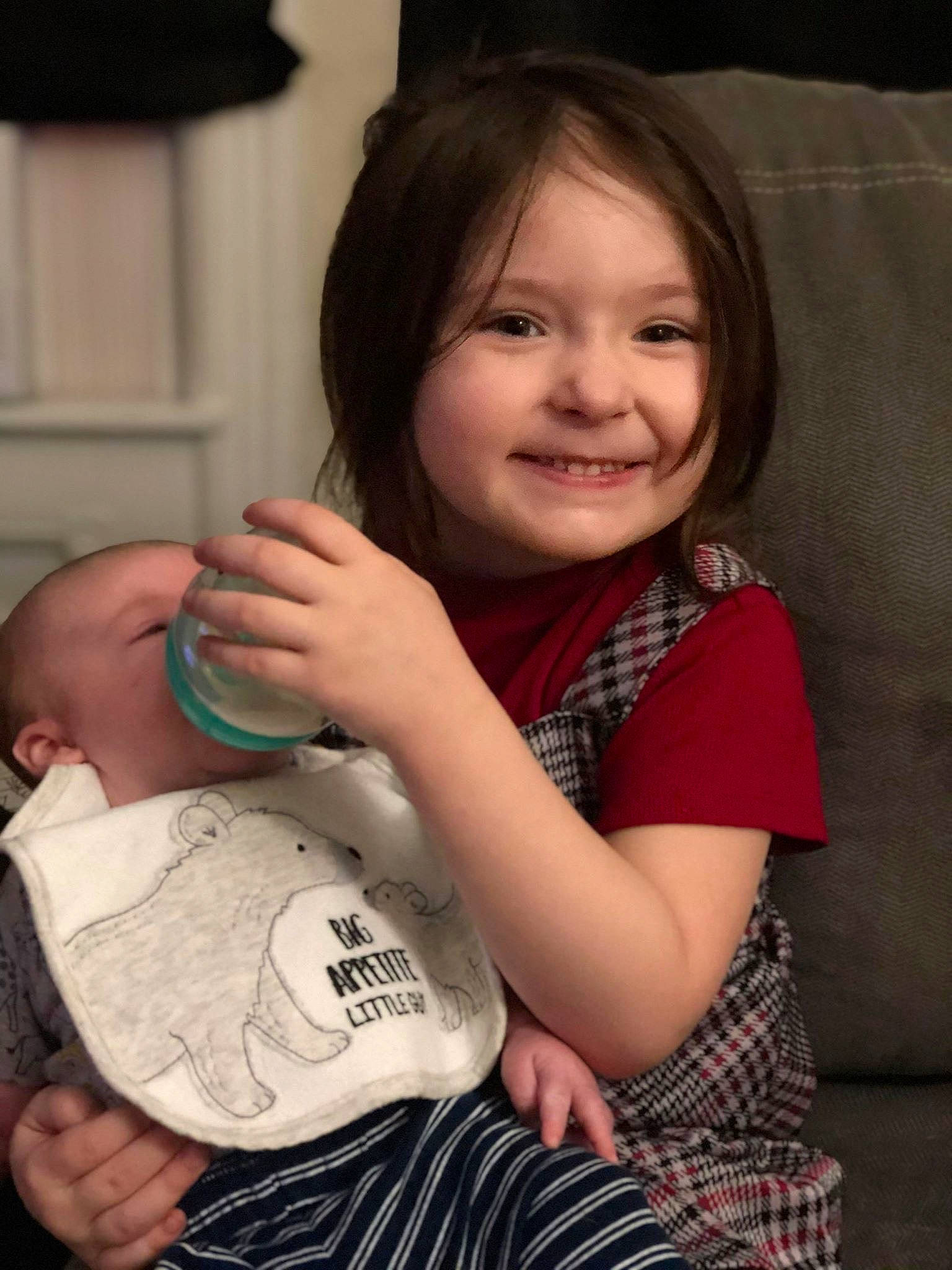 Carsin Michael-lee Christman is registered to the contest to win money with this photo: arm, baby, cheek, child, daughter, finger, hand, joy, mother, person, sitting, skin, smile, toddler