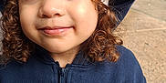 Reychell joined the competition — help win amazing prizes! casual_clothing, child, curly_hair, cute, daylight, face, flower, greenery, hooded_jacket, looking_away, navy_blue, outdoor, person, portrait, sidewalk, smiling, toddler, truck, young_child, zipper