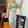 Reychell is registered to the contest to win money with this photo: black_sneakers, casual_clothing, chair, child, curtains, cute, furniture, gray_leggings, green_top, happy, home, indoor, person, photography, smiling, standing, stroller, toddler, wall, wooden_floor