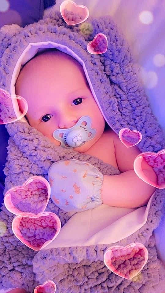 Lucifer joined the competition — help win amazing prizes! baby, baby_products, baby_toddler_clothing, beauty, cheek, child, doll, fashion_accessory, linens, magenta, pattern, peach, person, pink, product, purple, skin, textile, toddler, toy