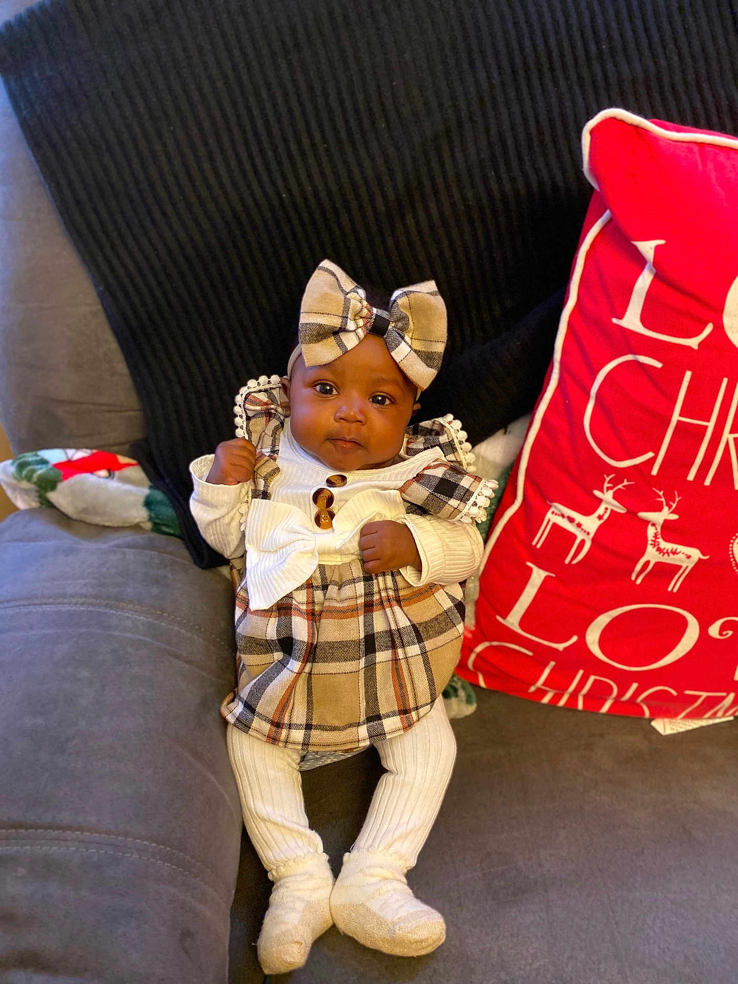 Jayonna is registered to the contest to win money with this photo: architecture, baby, clothing, costume, couch, cushion, doll, face, footwear, furniture, hat, head, homedecor, pants, person, photography, pillow, portrait, shoe, toy