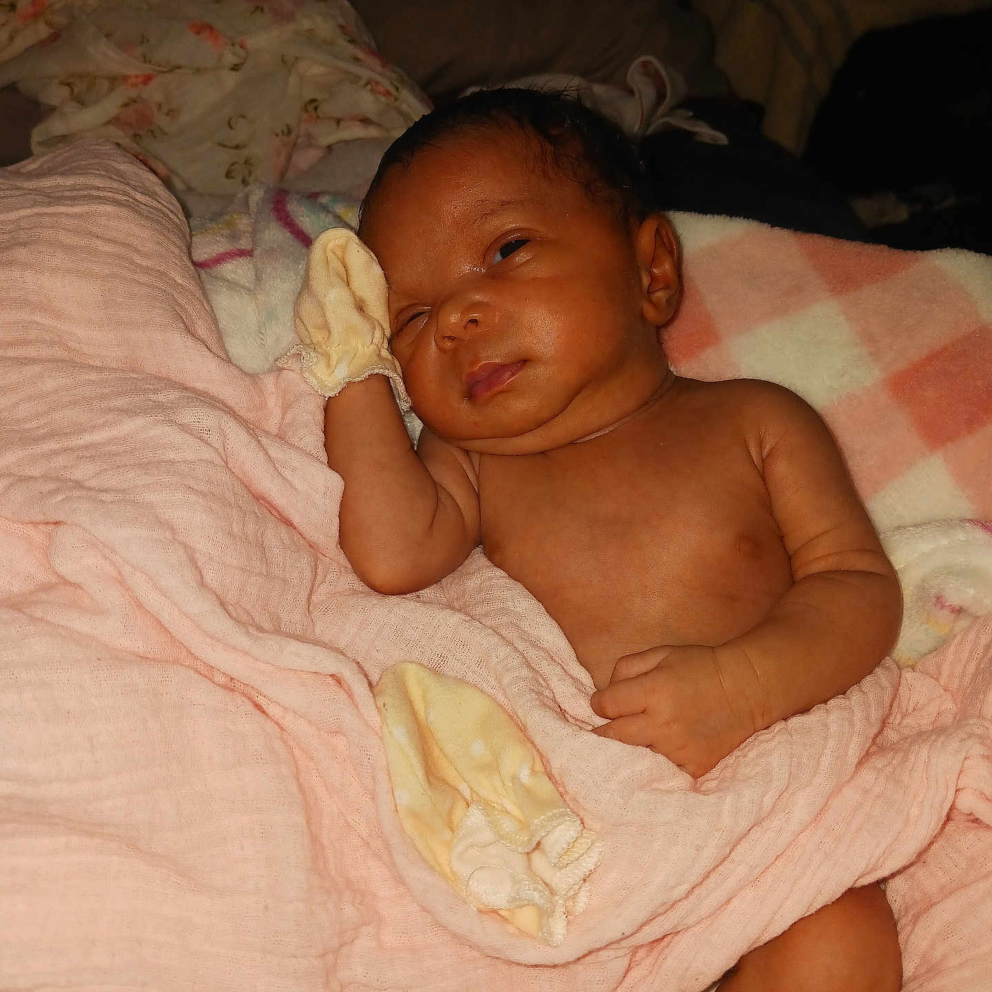 Brittley joined the competition — help win amazing prizes! newborn, baby, infant, child, sleeping, lying_down, face, portrait, blanket, pink_blanket, mitten, glove, bed, bedding, indoors, cozy, relaxed, skin, hand, photography