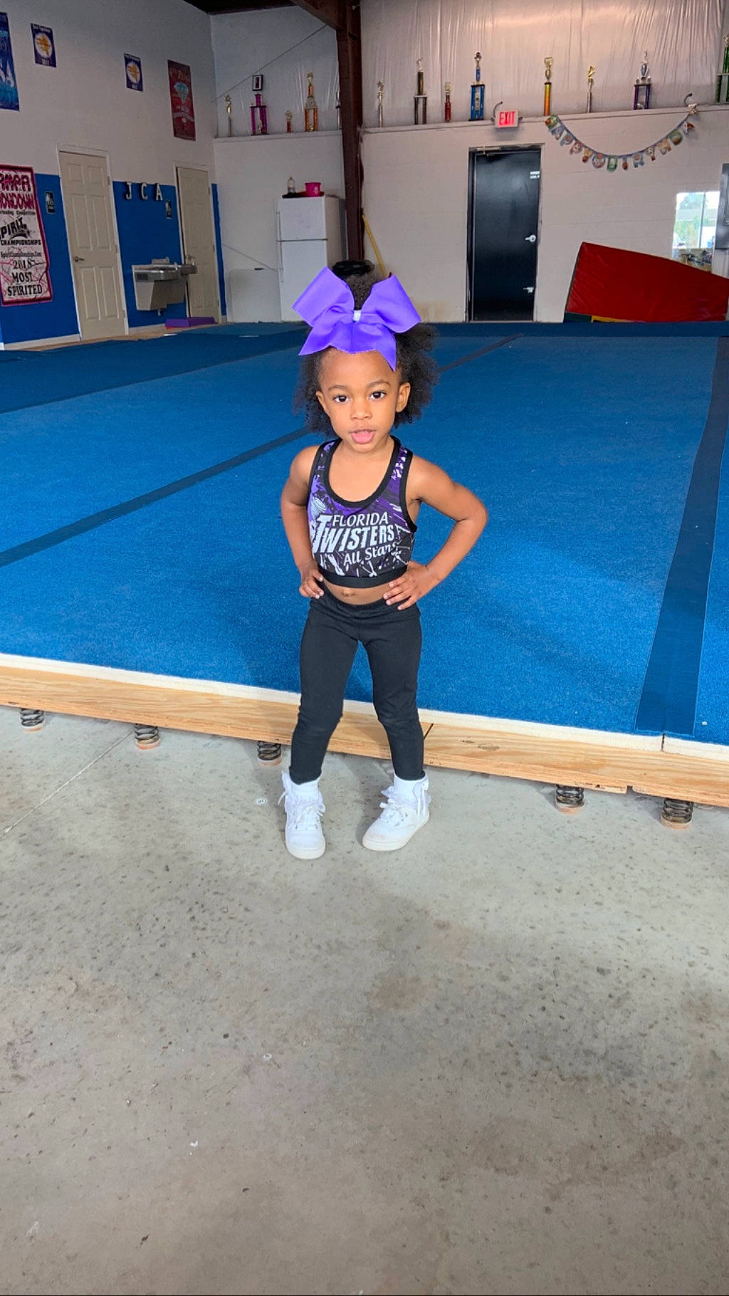 Rayana is registered to the contest to win money with this photo: artistic_gymnastics, child, fun, leisure, person, sportswear, vacation