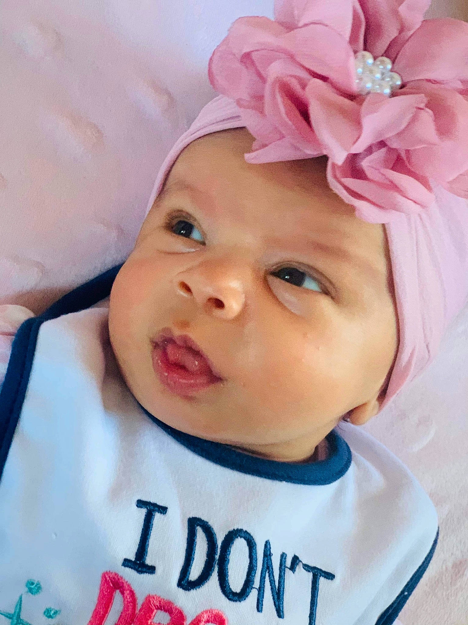 Jazlyn is registered to the contest to win money with this photo: baby, baby_toddler_clothing, cap, cheek, chin, clothing, cool, eyebrow, eyelash, face, facial_expression, happy, headgear, headwear, iris, lip, organ, person, pink, skin