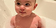 Violet is registered to the contest to win money with this photo: baby, bath, bathroom, bubble_crown, bubbles, child, cute, face, foam, fun, happy, head, indoors, infant, playful, sitting, skin, tub, water, wet