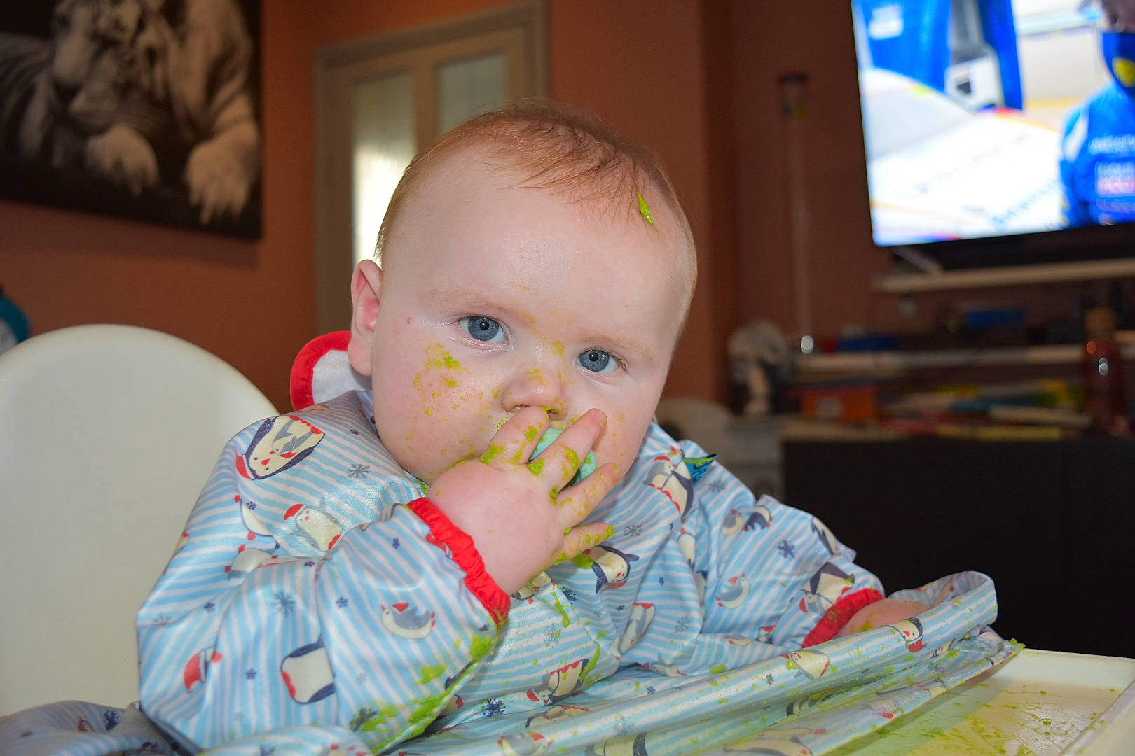 Tyler is registered to the contest to win money with this photo: baby, baby_products, baby_toddler_clothing, chair, cheek, child, comfort, eye, fun, happy, head, iris, nose, person, picture_frame, room, sitting, skin, toddler