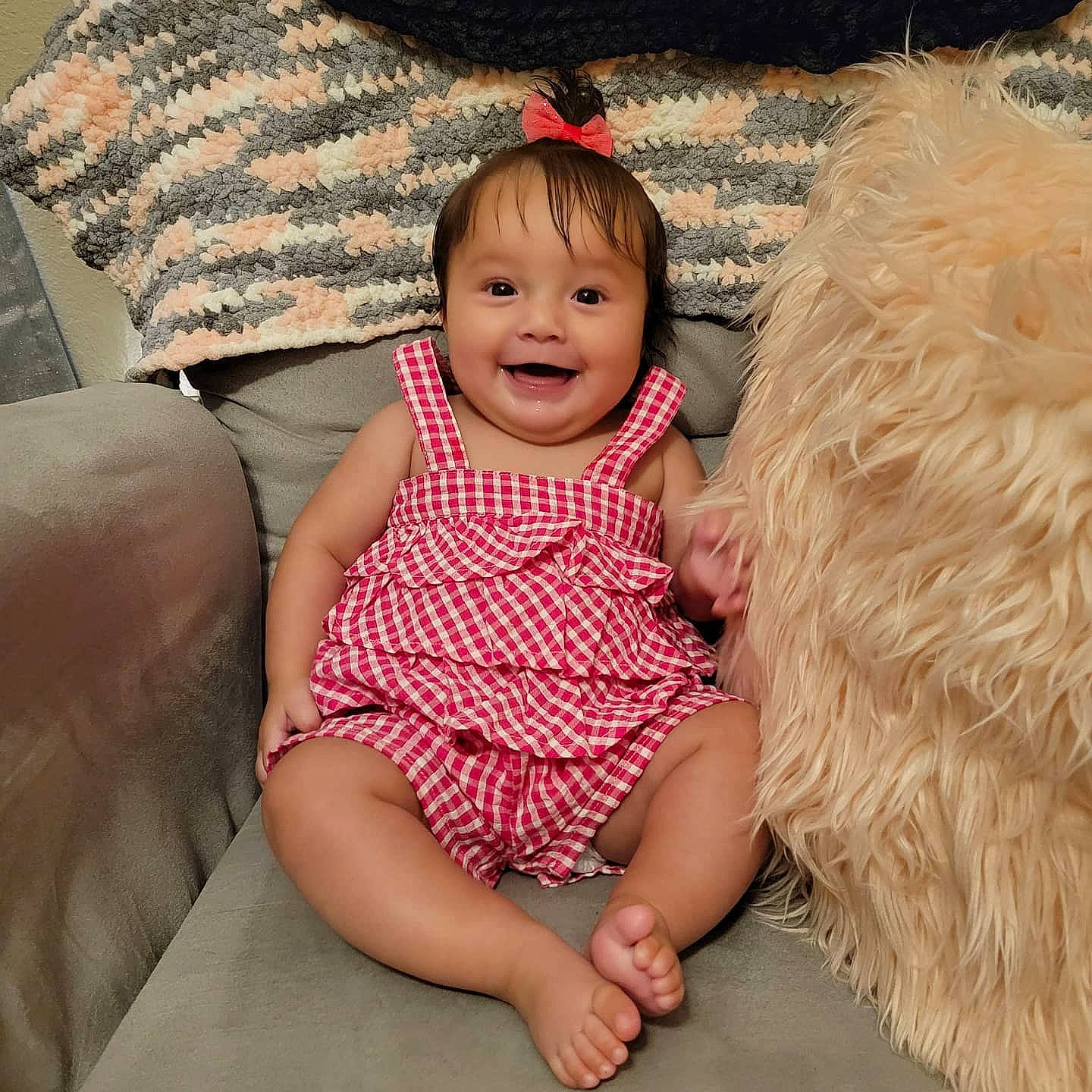 Amaris is registered to the contest to win money with this photo: baby_toddler_clothing, beauty, cheek, child, comfort, couch, dress, event, face, fun, happy, head, interaction, iris, joy, person, pink, skin, smile, textile