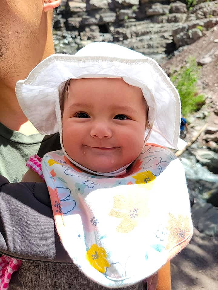 Amaris is registered to the contest to win money with this photo: baby, baby_toddler_clothing, beauty, bib, cheek, child, chin, grass, happy, headwear, iris, joy, leisure, lip, mouth, people_in_nature, person, product, recreation, skin