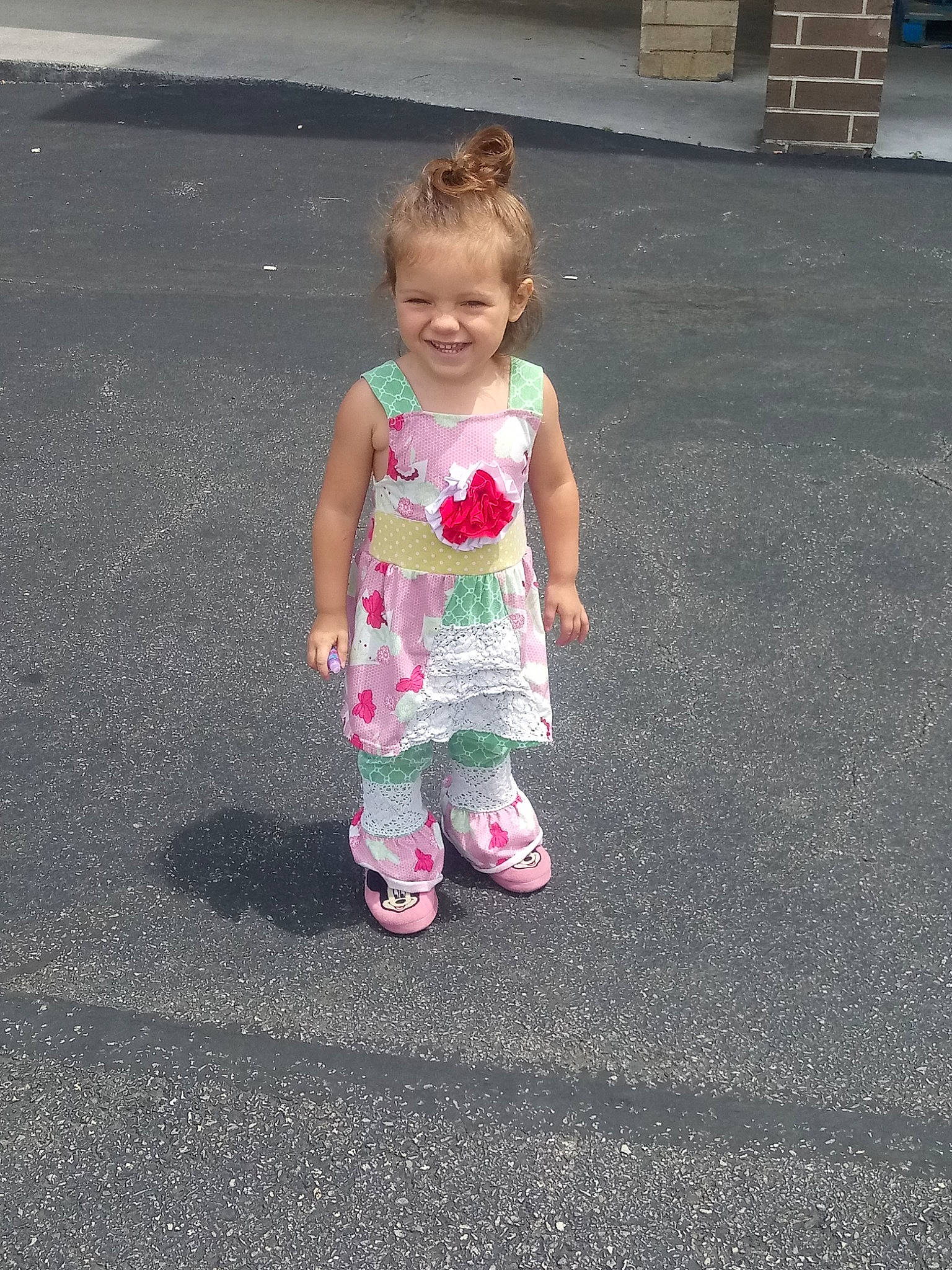 Lexi is registered to the contest to win money with this photo: asphalt, child, joy, person, pink, play, road_surface, smile, summer, toddler, vacation