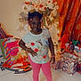 Azalea is registered to the contest to win money with this photo: accessories, architecture, building, child, clothing, couch, face, female, footwear, furniture, girl, head, indoors, livingroom, person, photography, portrait, room, shoe, shorts