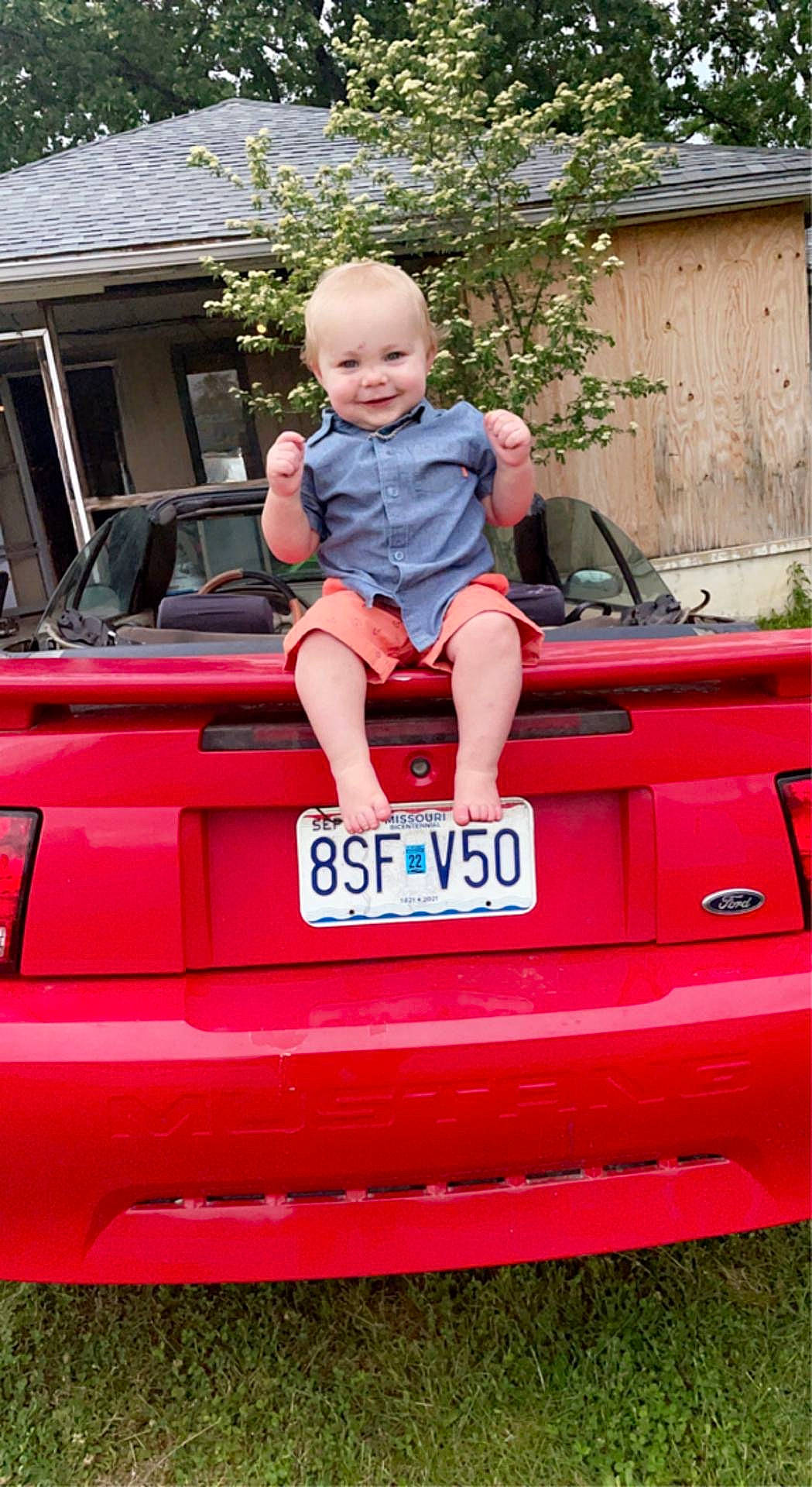 Josiah joined the competition — help win amazing prizes! auto_part, automotive_design, automotive_exterior, automotive_lighting, automotive_tail_brake_light, bumper, car, grass, hood, joy, motor_vehicle, person, pink, plant, shorts, smile, toddler, trunk, vehicle, vehicle_door