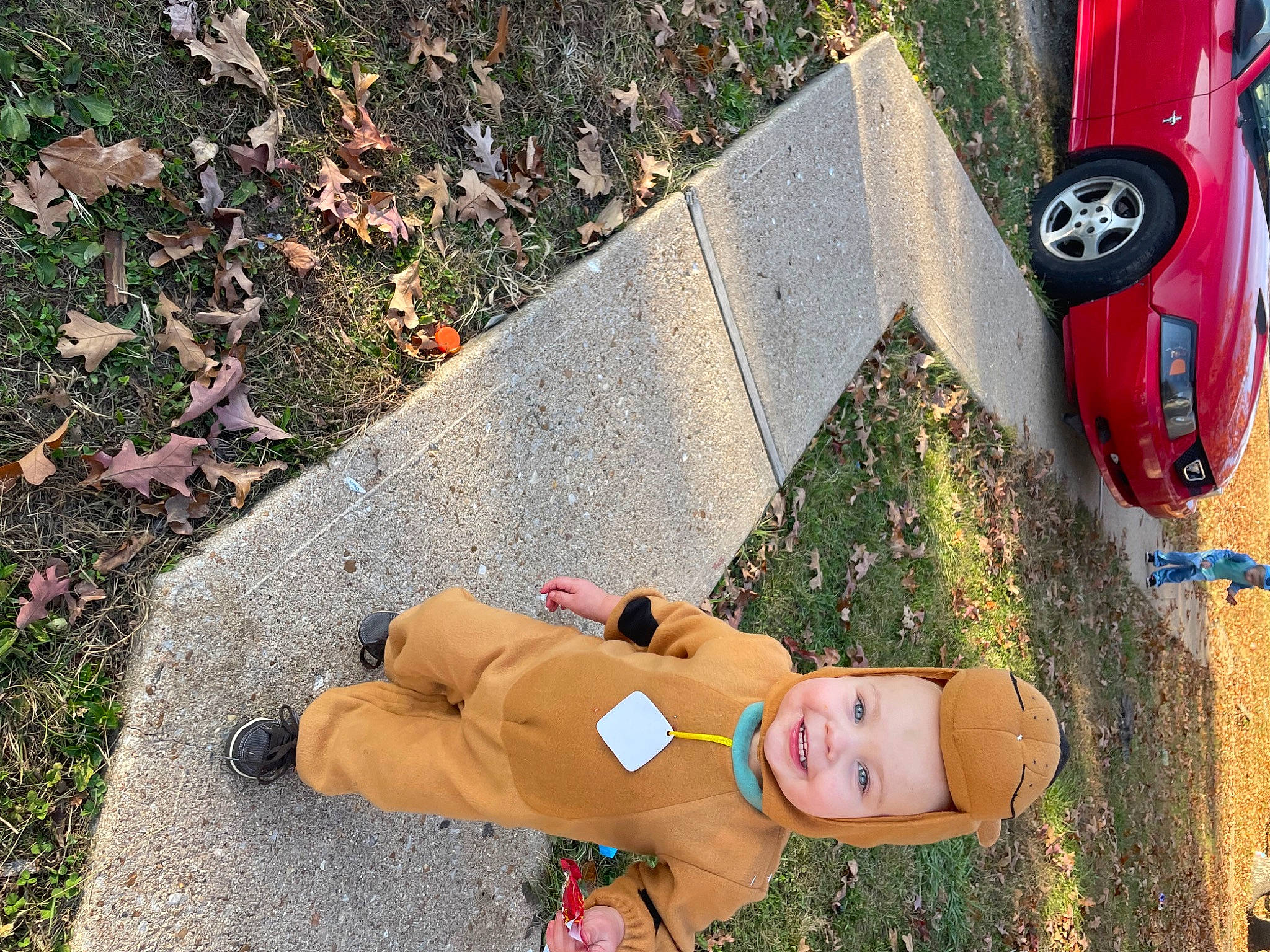 Sofia joined the competition — help win amazing prizes! asphalt, automotive_lighting, automotive_tire, bumper, car, grass, human_leg, joy, lawn, leg, leisure, people_in_nature, person, plant, road_surface, shoe, sidewalk, sneakers, tints_and_shades, toy