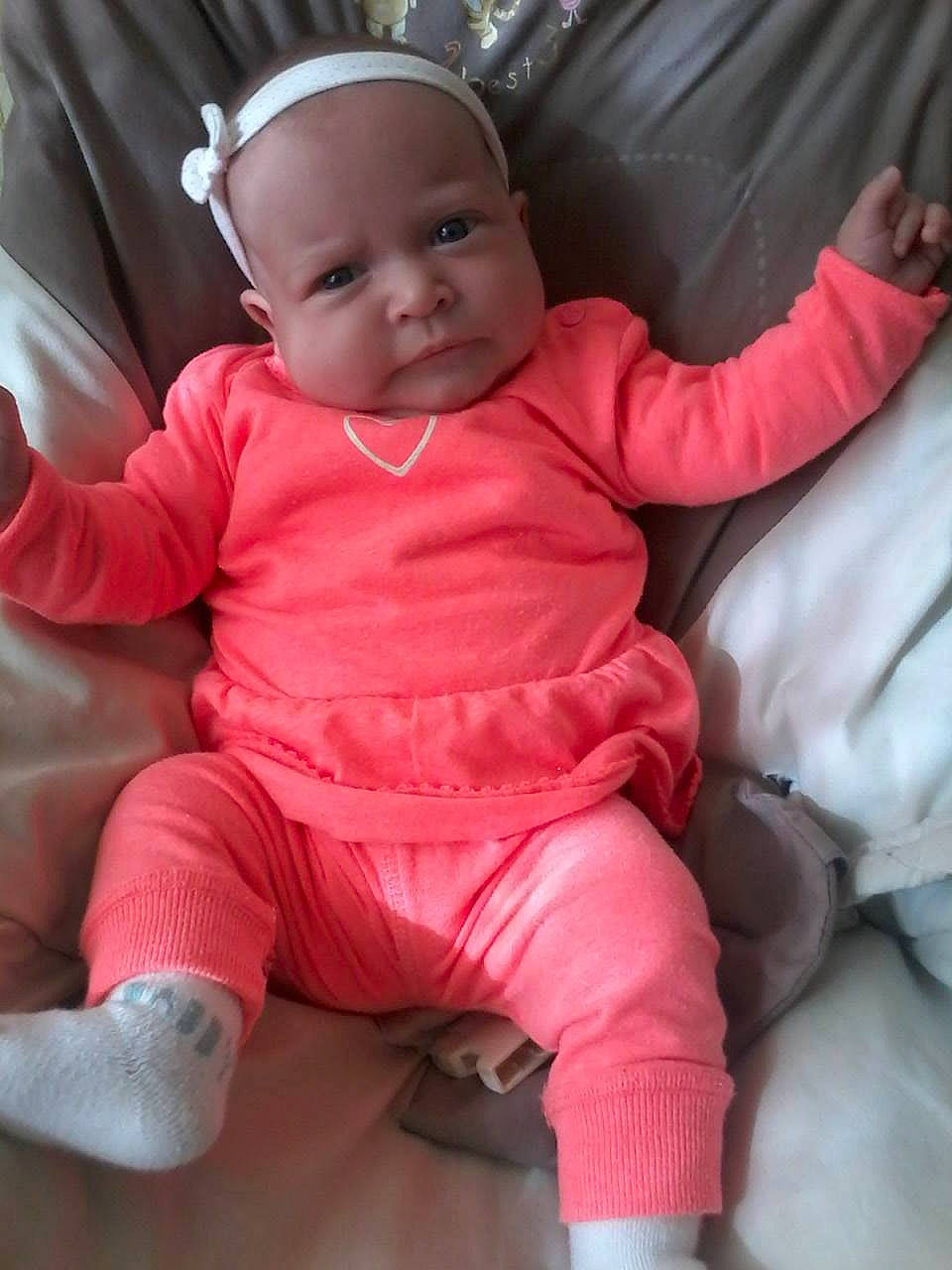 Chloe Ghislaine participe au concours pour gagner de l'argent avec cette photo : baby, baby_toddler_clothing, carmine, cheek, child, comfort, eye, foot, fun, happy, magenta, person, pink, sitting, sleeve, smile, sock, t_shirt, thumb, toddler