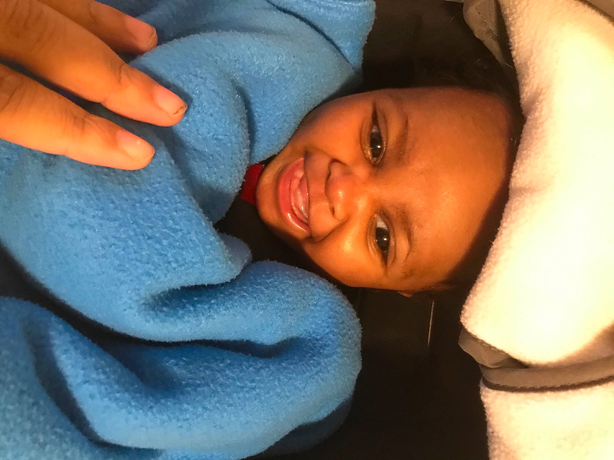 Armoni is registered to the contest to win money with this photo: cheek, child, comfort, facial_expression, finger, gesture, happy, jaw, joint, joy, laugh, muscle, nail, neck, person, portrait_photography, skin, sweater, thumb, toddler