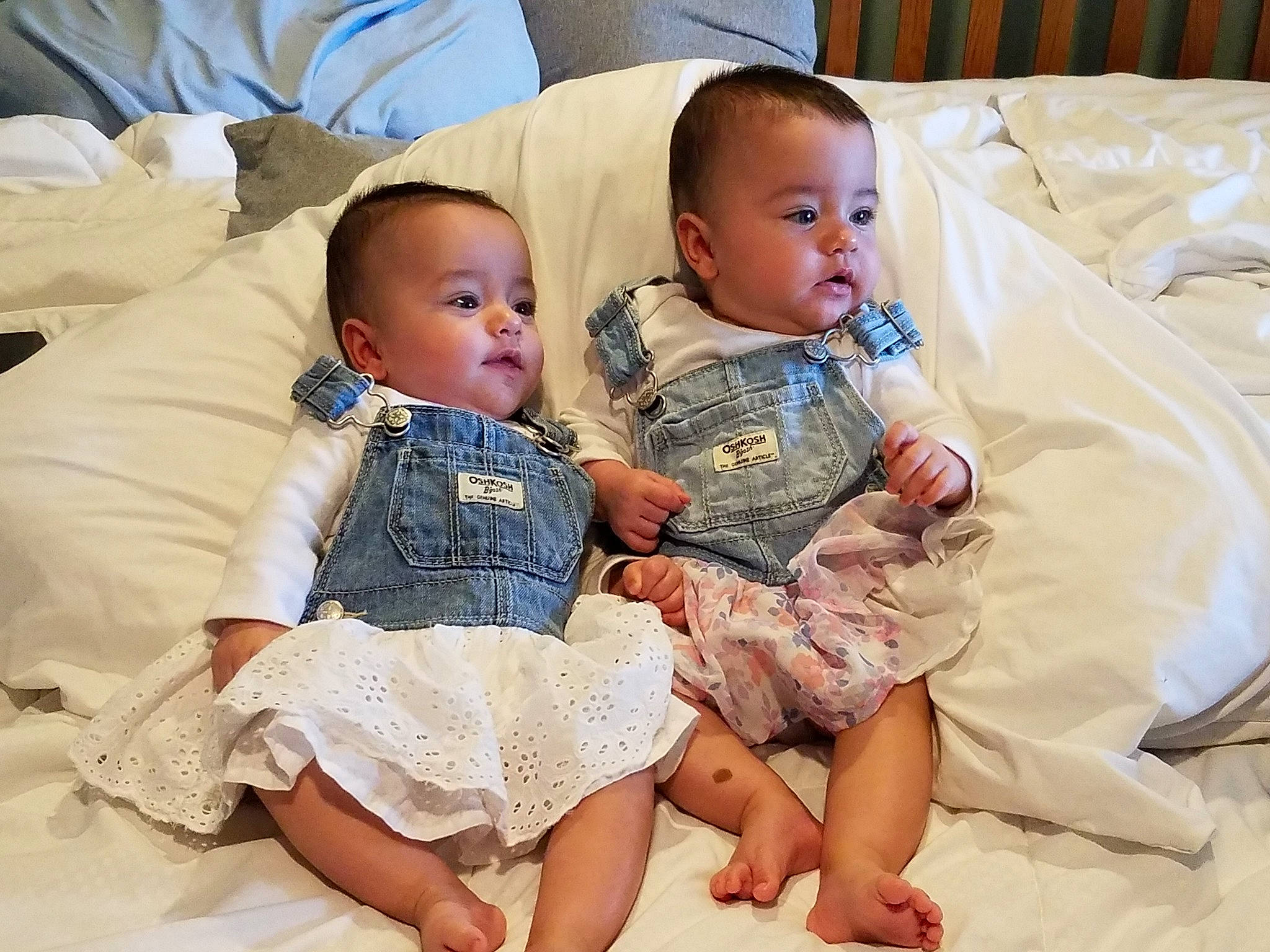 Maggie Macy is registered to the contest to win money with this photo: baby, cheek, child, eye, family, finger, fun, head, headwear, human, iris, leg, nose, people, person, product, sibling, sitting, skin, smile