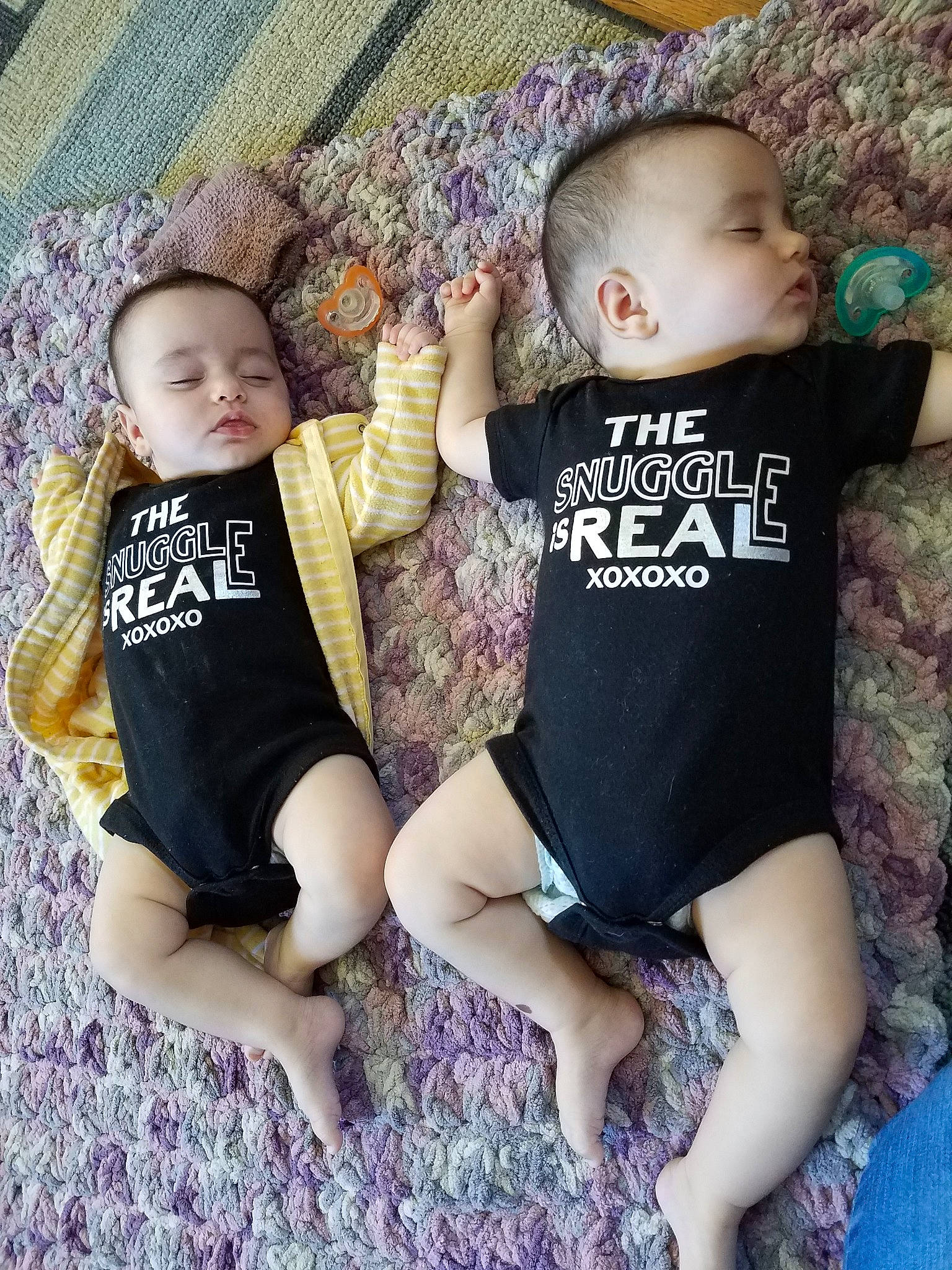 Maggie Macy is registered to the contest to win money with this photo: arm, baby, baby_toddler_clothing, child, cool, hand, happy, leg, outerwear, pattern, people, person, product, sibling, sitting, sleeve, smile, sportswear, t_shirt, thigh