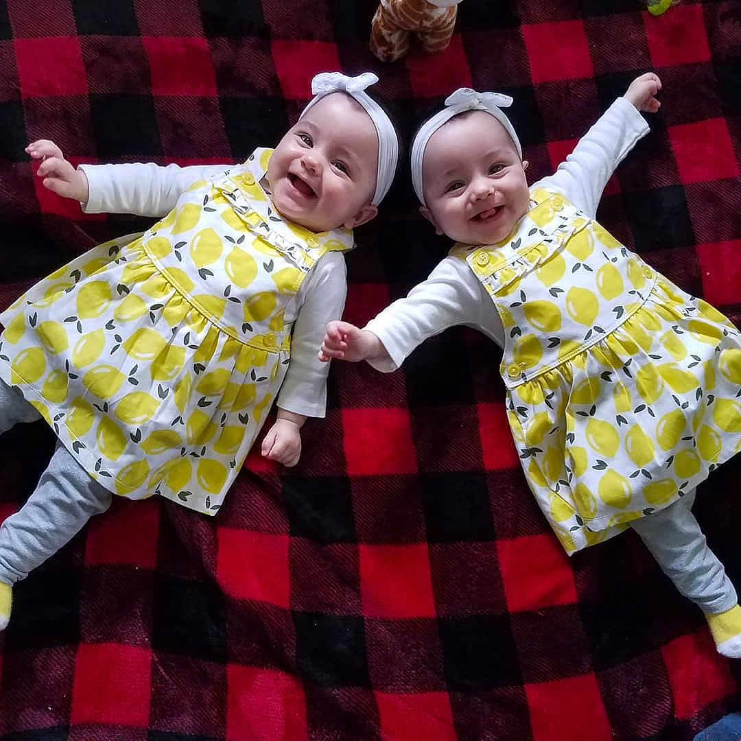 Maggie Macy is registered to the contest to win money with this photo: child, design, fun, joy, pattern, person, plaid, textile, toddler