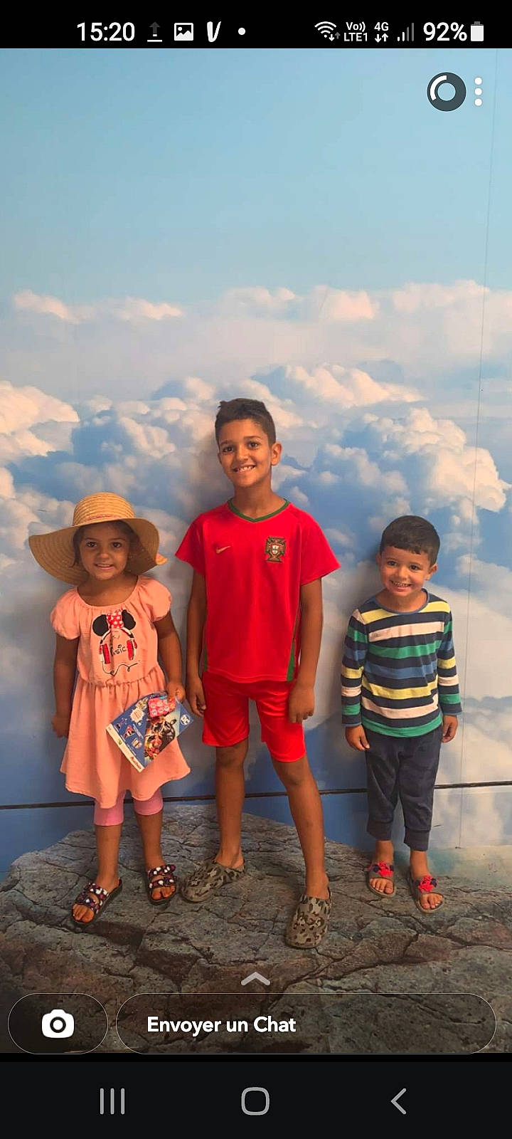 Yanis participe au concours pour gagner de l'argent avec cette photo : child, cloud, event, face, facial_expression, flash_photography, friendship, fun, happy, hat, headwear, joy, landscape, leisure, person, shorts, skin, sky, smile, sun_hat